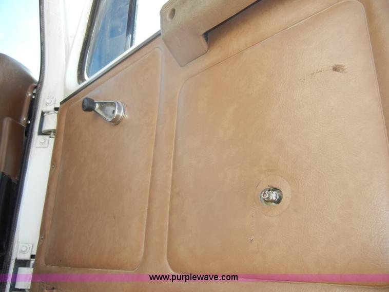 image for item D4619 1982 International 1754 Easy-Rider 1600C Loral spreader truck