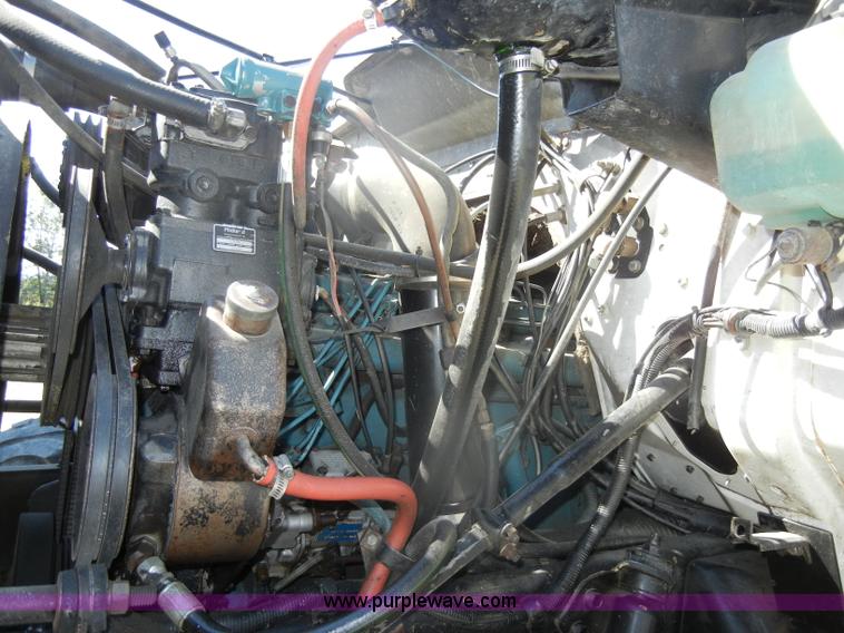 image for item D4619 1982 International 1754 Easy-Rider 1600C Loral spreader truck