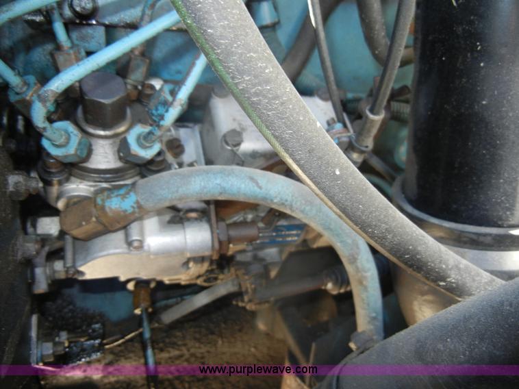 image for item D4619 1982 International 1754 Easy-Rider 1600C Loral spreader truck