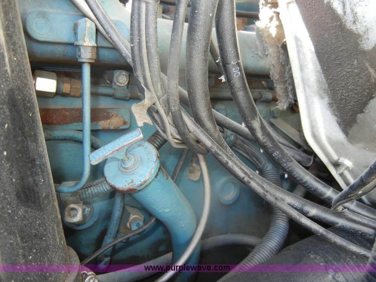 image for item D4619 1982 International 1754 Easy-Rider 1600C Loral spreader truck