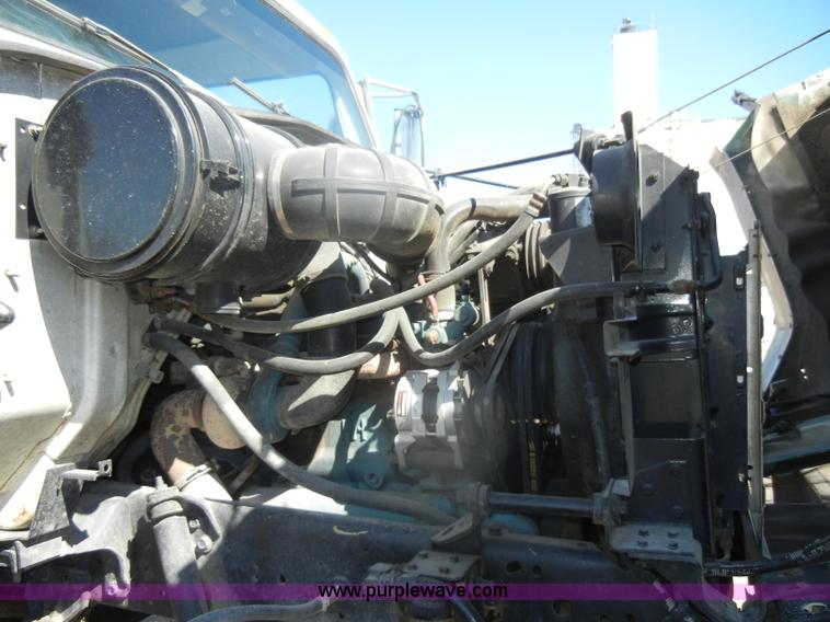 image for item D4619 1982 International 1754 Easy-Rider 1600C Loral spreader truck