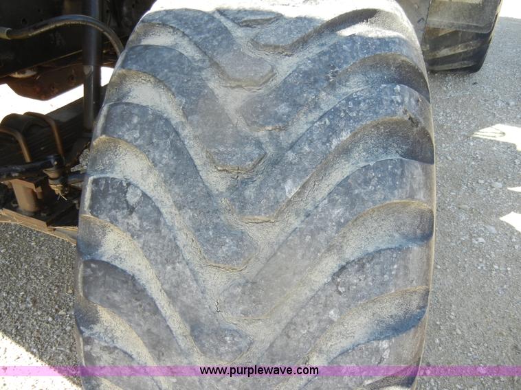 image for item D4619 1982 International 1754 Easy-Rider 1600C Loral spreader truck