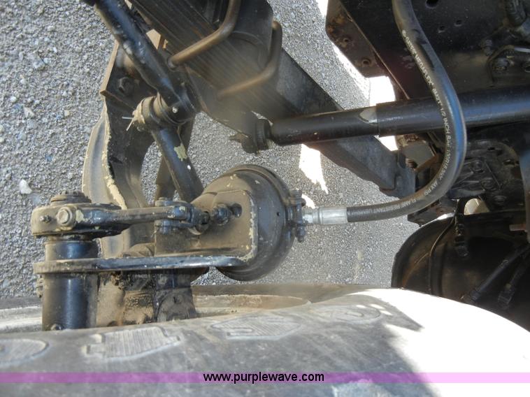 image for item D4619 1982 International 1754 Easy-Rider 1600C Loral spreader truck