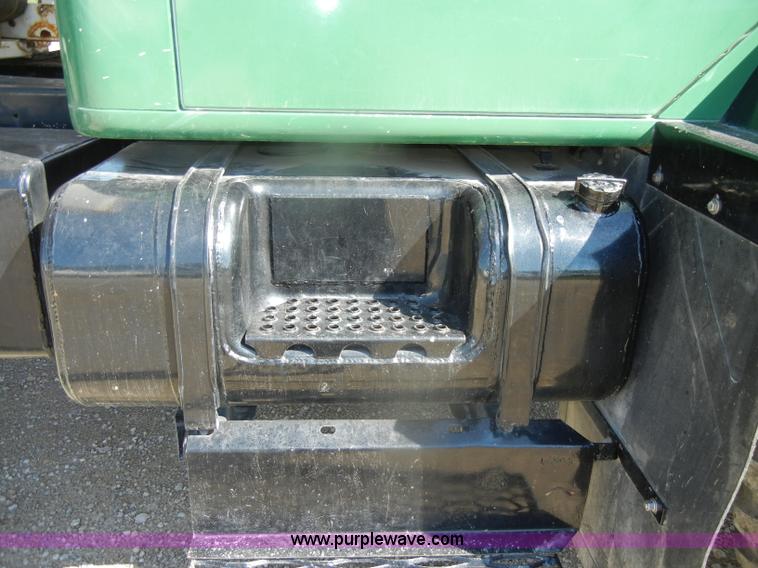 image for item D4619 1982 International 1754 Easy-Rider 1600C Loral spreader truck