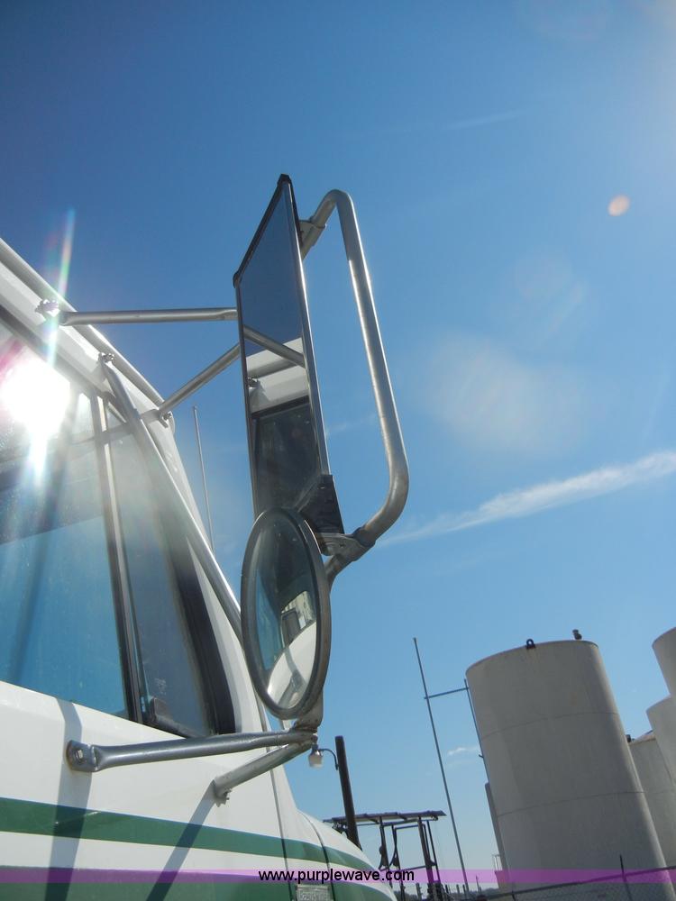 image for item D4619 1982 International 1754 Easy-Rider 1600C Loral spreader truck