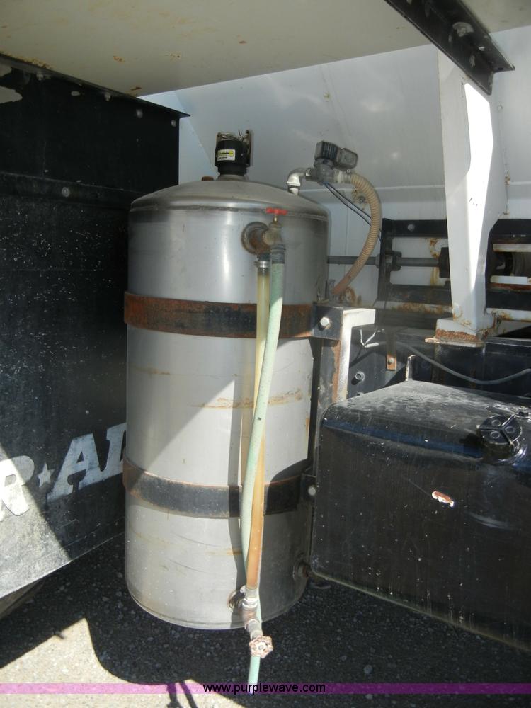 image for item D4619 1982 International 1754 Easy-Rider 1600C Loral spreader truck