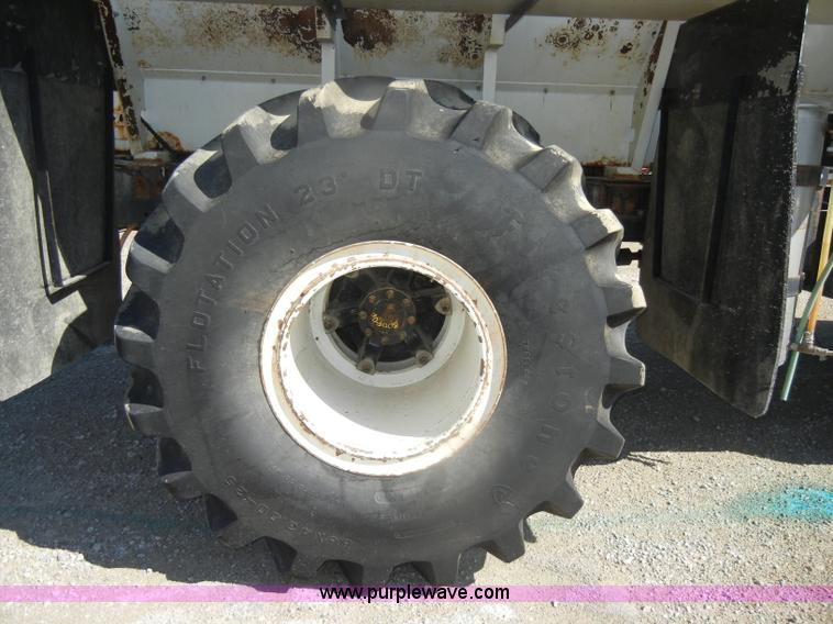 image for item D4619 1982 International 1754 Easy-Rider 1600C Loral spreader truck