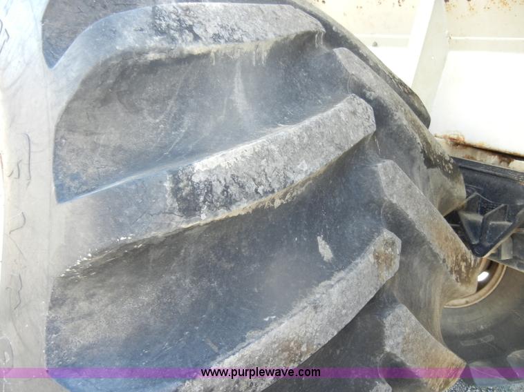 image for item D4619 1982 International 1754 Easy-Rider 1600C Loral spreader truck