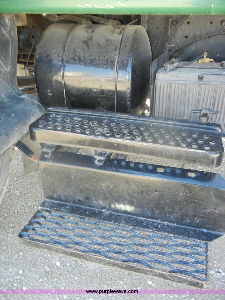 image for item D4619 1982 International 1754 Easy-Rider 1600C Loral spreader truck