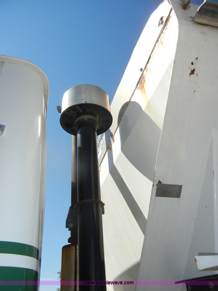 image for item D4619 1982 International 1754 Easy-Rider 1600C Loral spreader truck