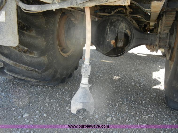 image for item D4619 1982 International 1754 Easy-Rider 1600C Loral spreader truck