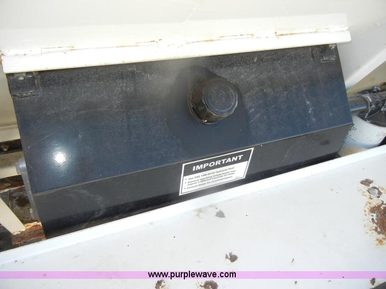 image for item D4619 1982 International 1754 Easy-Rider 1600C Loral spreader truck