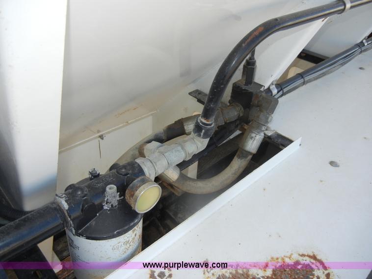 image for item D4619 1982 International 1754 Easy-Rider 1600C Loral spreader truck