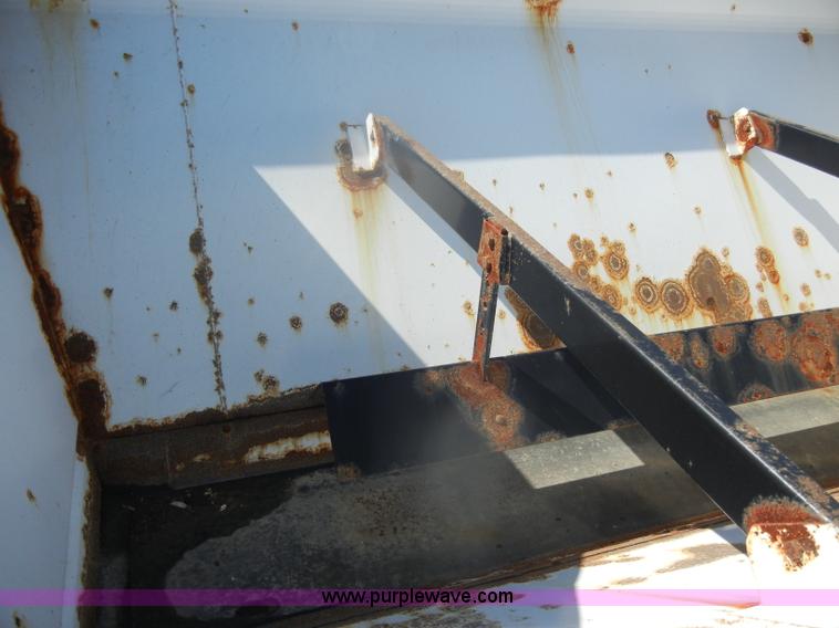 image for item D4619 1982 International 1754 Easy-Rider 1600C Loral spreader truck