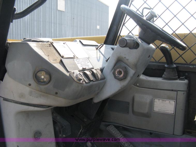 image for item B8065 1997 Caterpillar TH83 telehandler
