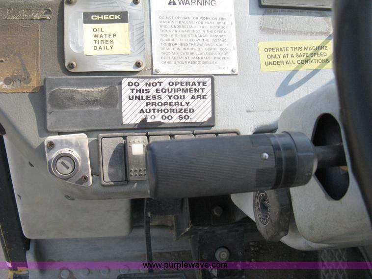 image for item B8065 1997 Caterpillar TH83 telehandler