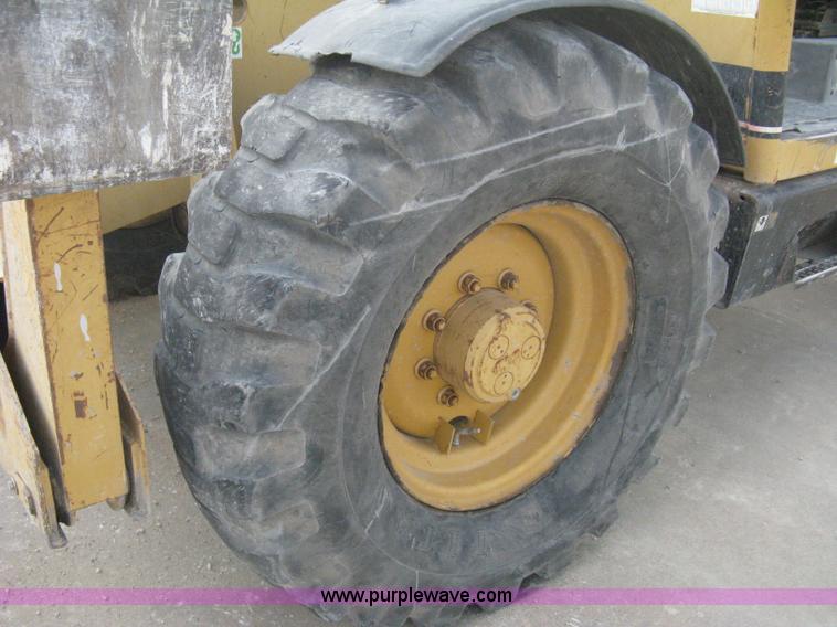 image for item B8065 1997 Caterpillar TH83 telehandler