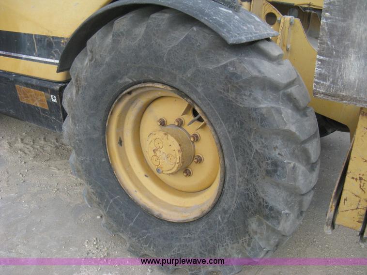 image for item B8065 1997 Caterpillar TH83 telehandler