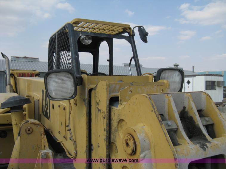 image for item B8065 1997 Caterpillar TH83 telehandler