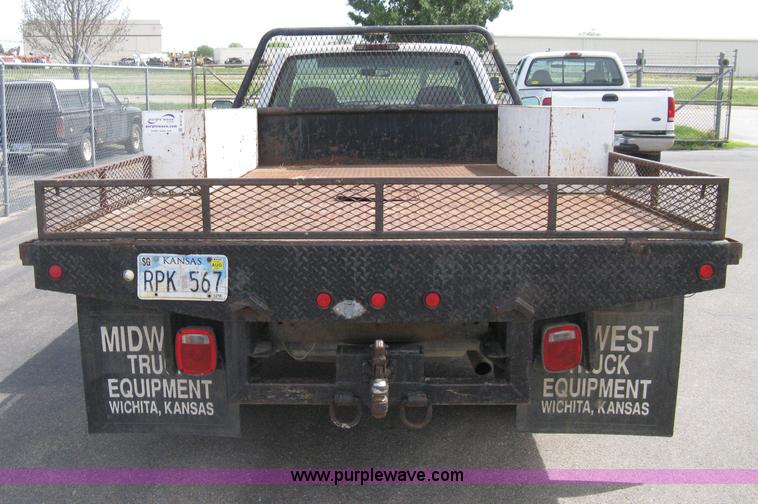image for item B8113 1998 GMC Sierra 3500 SL flatbed pickup truck