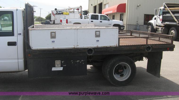 image for item B8113 1998 GMC Sierra 3500 SL flatbed pickup truck