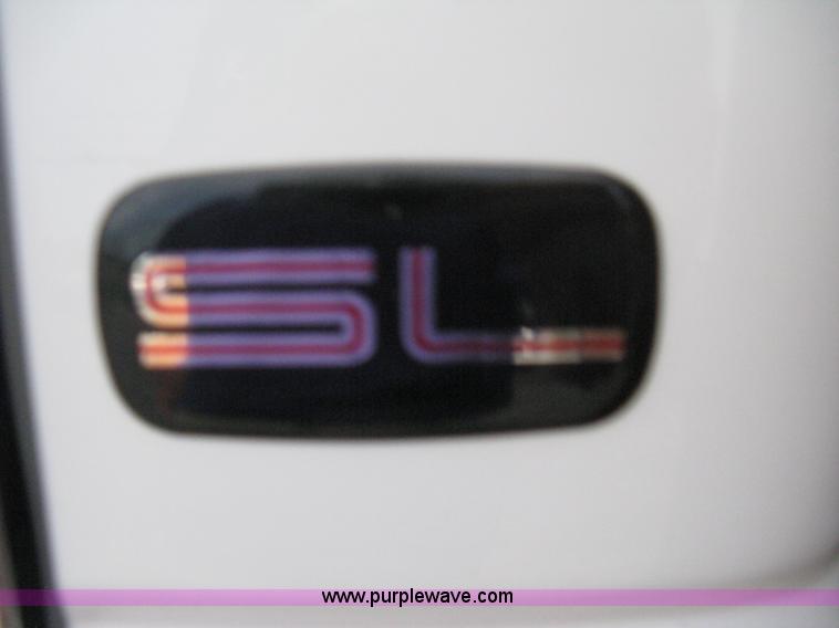 image for item B8113 1998 GMC Sierra 3500 SL flatbed pickup truck