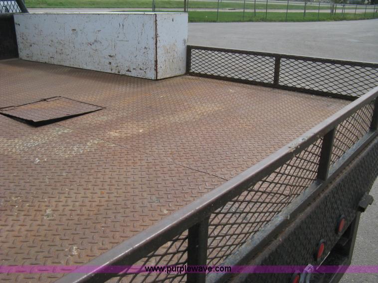 image for item B8113 1998 GMC Sierra 3500 SL flatbed pickup truck