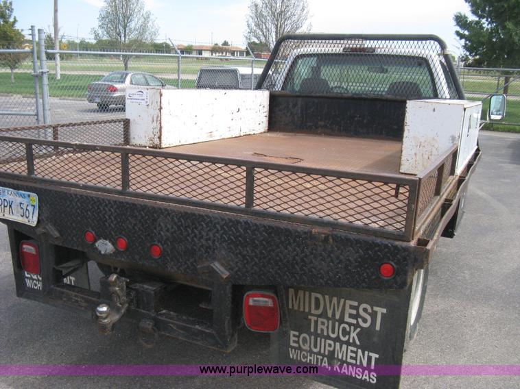 image for item B8113 1998 GMC Sierra 3500 SL flatbed pickup truck