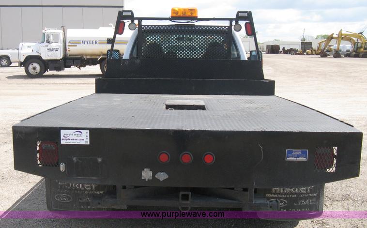 image for item B8119 2008 Ford F550 Super Duty flatbed pickup truck