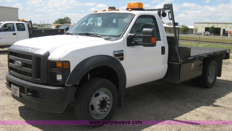 image for item B8119 2008 Ford F550 Super Duty flatbed pickup truck