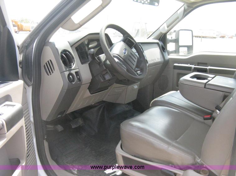 image for item B8119 2008 Ford F550 Super Duty flatbed pickup truck