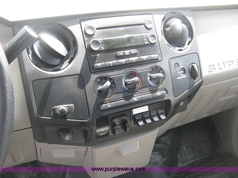 image for item B8119 2008 Ford F550 Super Duty flatbed pickup truck