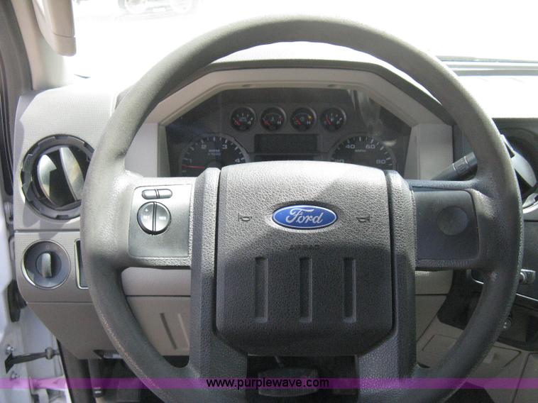 image for item B8119 2008 Ford F550 Super Duty flatbed pickup truck
