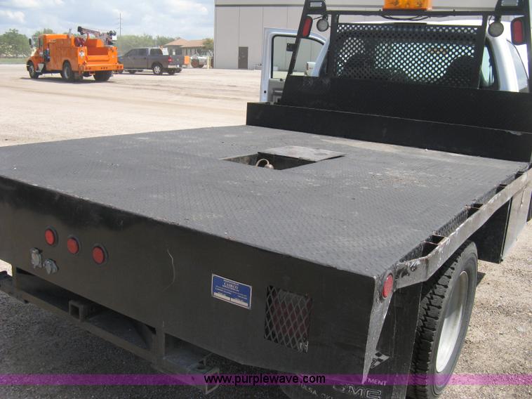 image for item B8119 2008 Ford F550 Super Duty flatbed pickup truck
