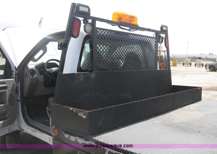 image for item B8119 2008 Ford F550 Super Duty flatbed pickup truck