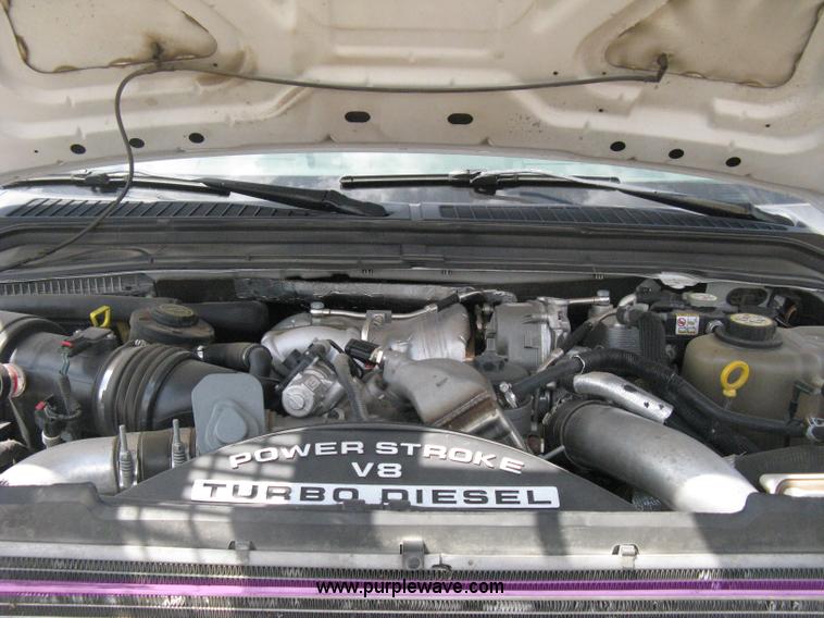 image for item B8119 2008 Ford F550 Super Duty flatbed pickup truck