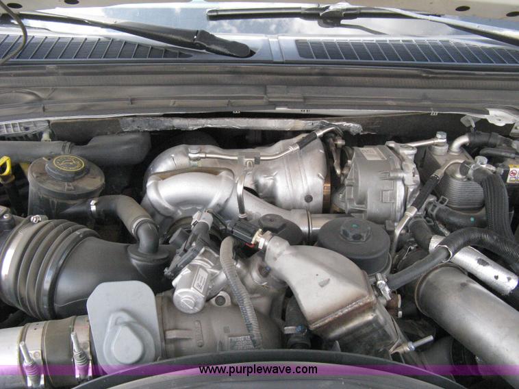 image for item B8119 2008 Ford F550 Super Duty flatbed pickup truck