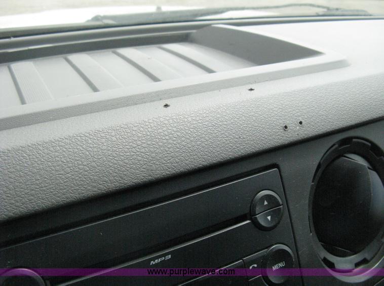 image for item B8119 2008 Ford F550 Super Duty flatbed pickup truck