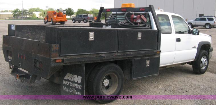 image for item B8120 2005 Chevrolet Silverado C3500 Extended Cab flatbed truck