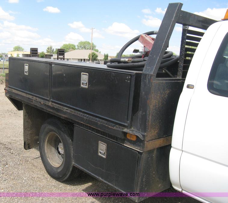 image for item B8120 2005 Chevrolet Silverado C3500 Extended Cab flatbed truck