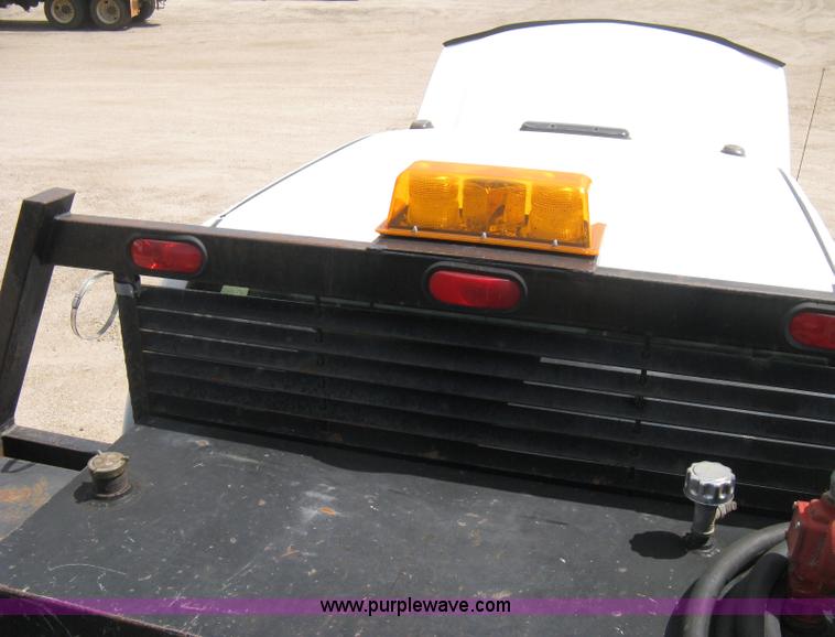 image for item B8120 2005 Chevrolet Silverado C3500 Extended Cab flatbed truck