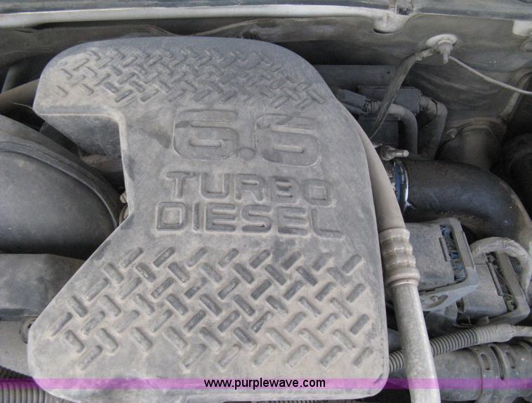 image for item B8123 2007 Chevrolet Silverado C3500 Extended Cab flatbed truck