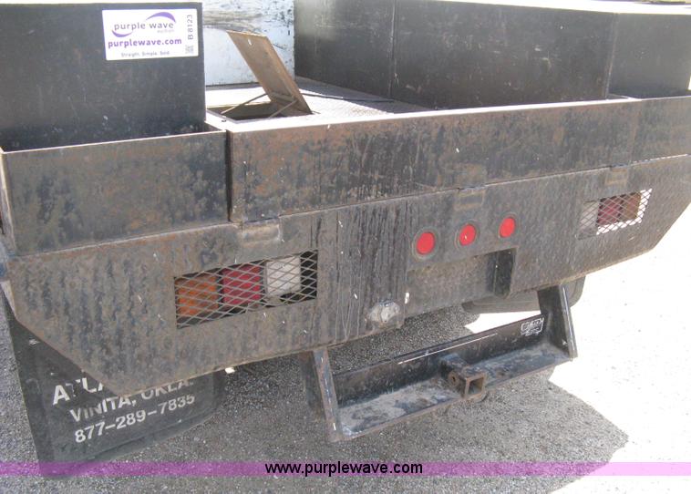 image for item B8123 2007 Chevrolet Silverado C3500 Extended Cab flatbed truck