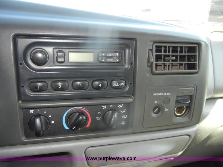 image for item D4465 2003 Ford F550 XL Super Duty boom lift utility truck