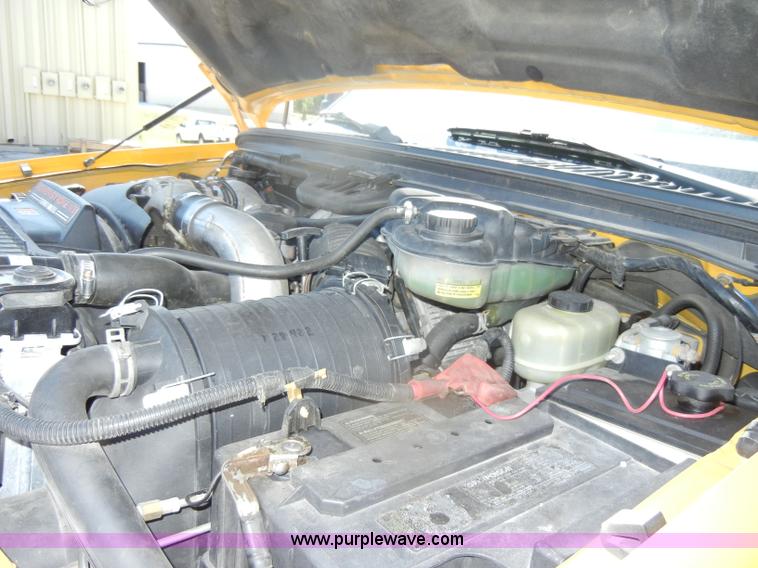 image for item D4465 2003 Ford F550 XL Super Duty boom lift utility truck