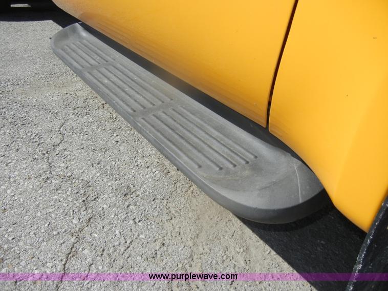 image for item D4465 2003 Ford F550 XL Super Duty boom lift utility truck