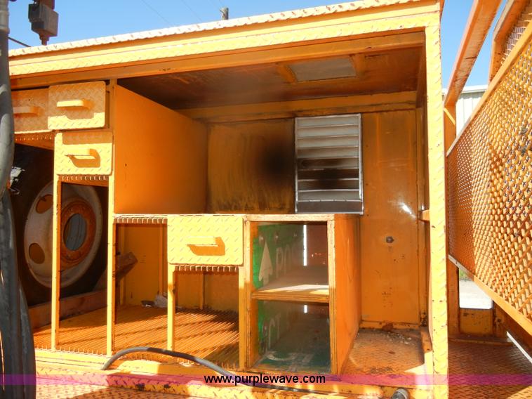 image for item D4465 2003 Ford F550 XL Super Duty boom lift utility truck