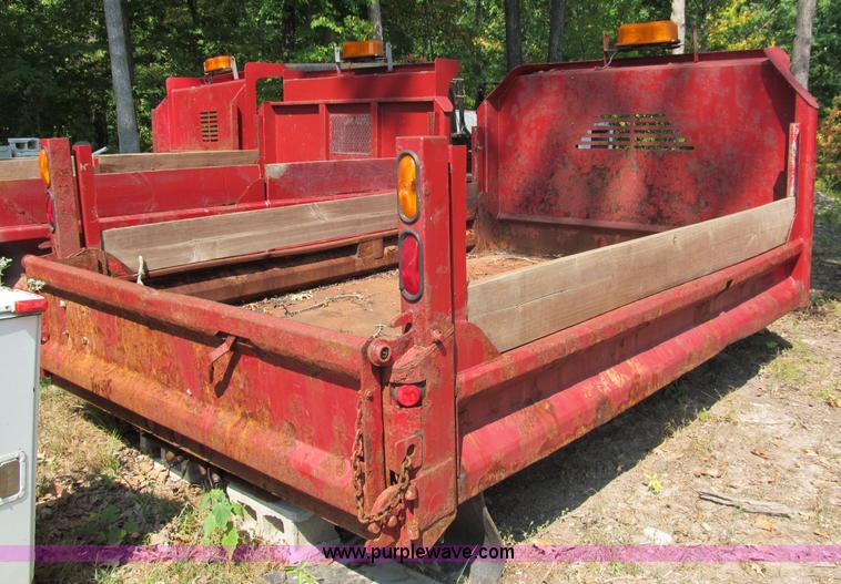 image for item E2086 11'L x 8'W dump bed with hoist