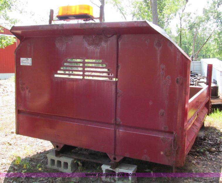 image for item E2086 11'L x 8'W dump bed with hoist