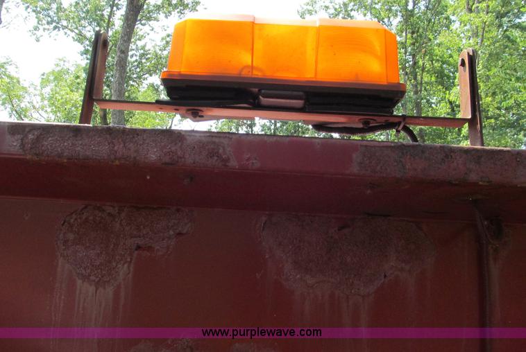 image for item E2086 11'L x 8'W dump bed with hoist